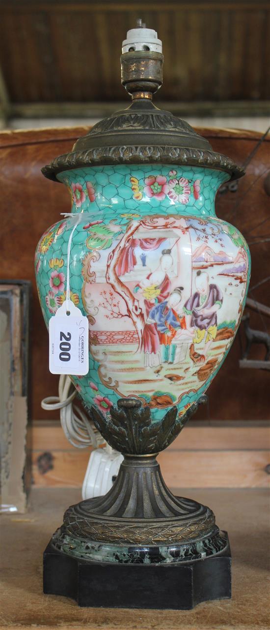 A Chinese famille rose vase, with European brass lamp fittings, late 19th / early 20th century, 45cm. to electric fitting